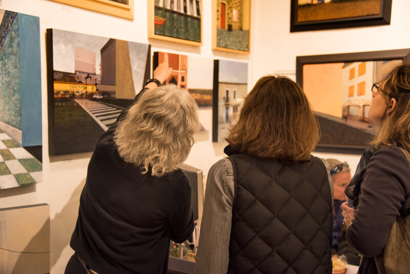 A Guide to Romance in Carmel-by-the-Sea Women looking at art in a gallery in Carmel-by-the-Sea, CA