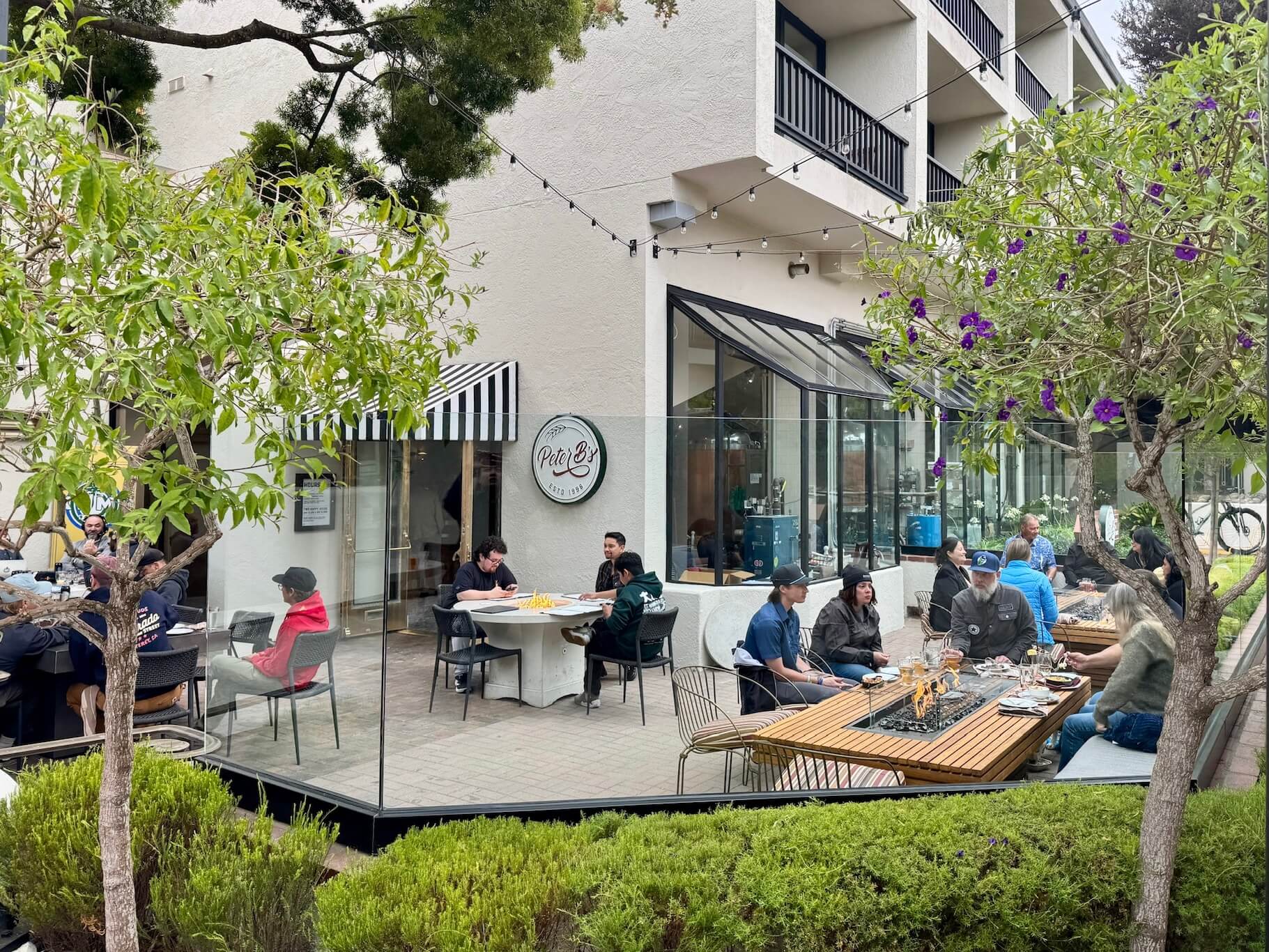 Outdoor patio seating with fire pits at Peter B's Brewpub in Monterey