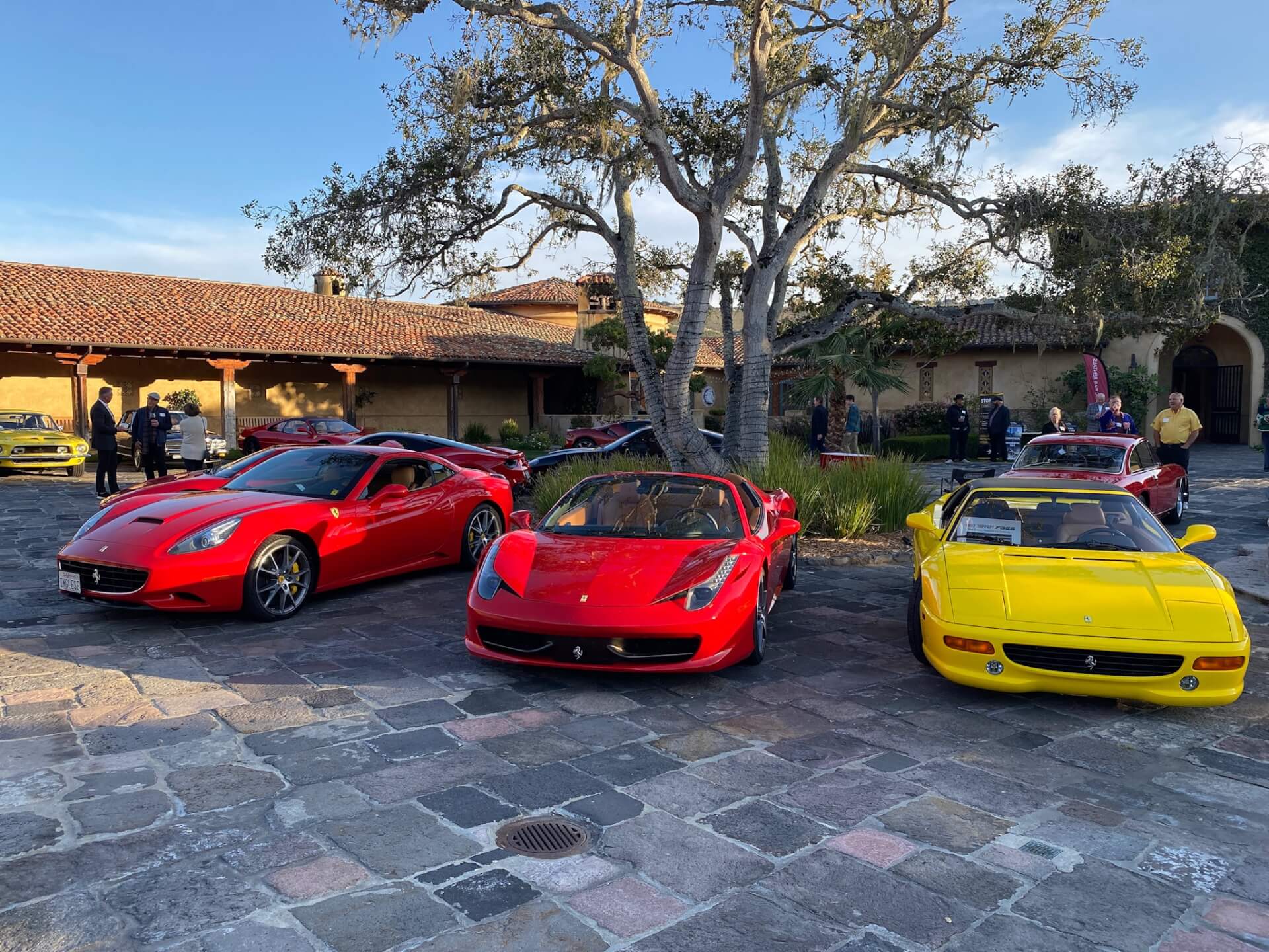 Race cars on display outdoors in Carmel Valley