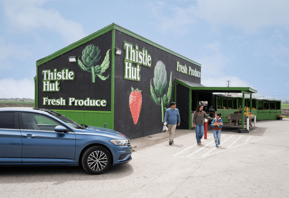 Moss Landing to King City Road Trip Itinerary This is a photo of a family at the Thistle Hut fresh produce stand in Castroville