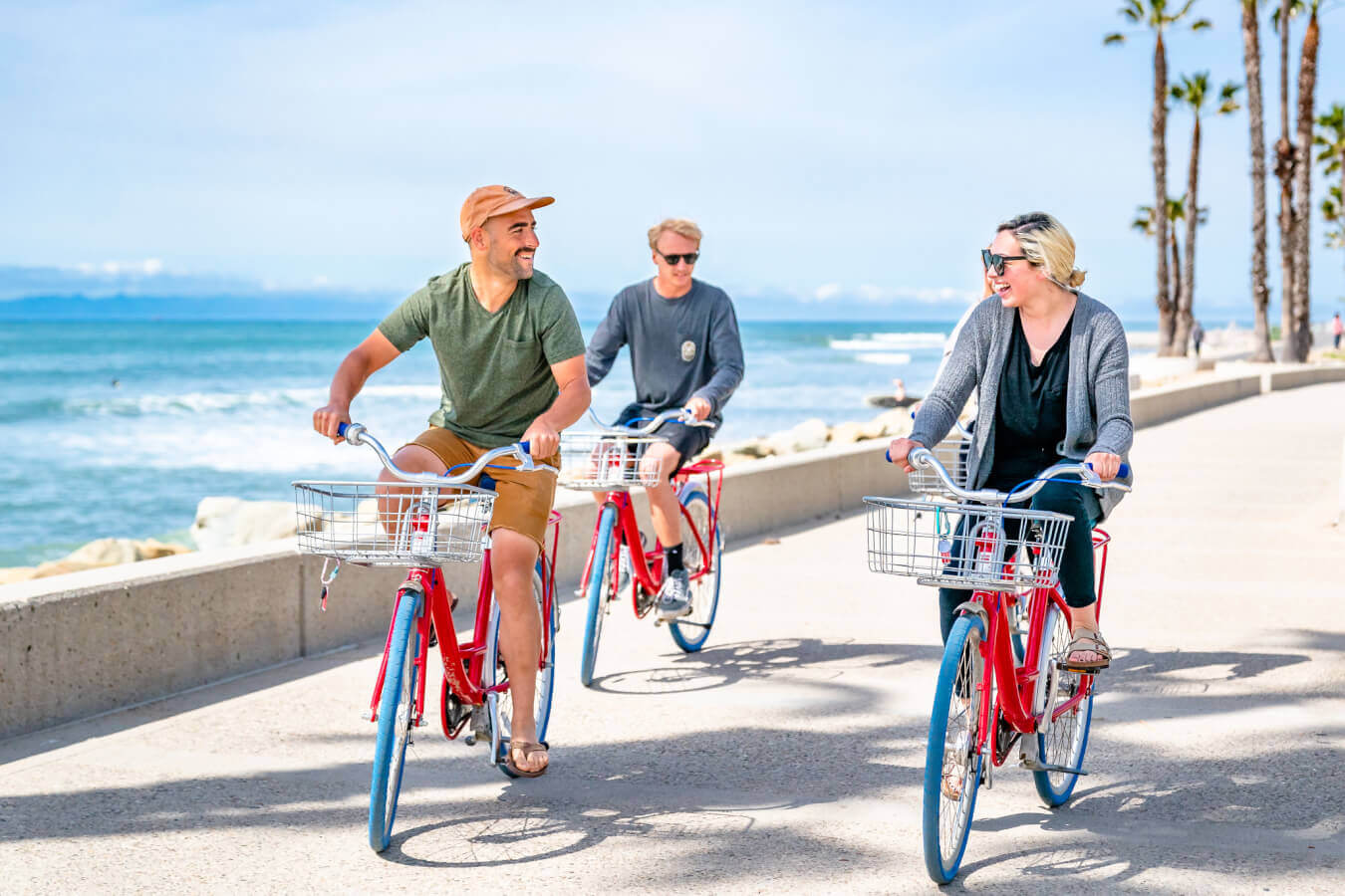 friends biking near ocean in Ventura, CA